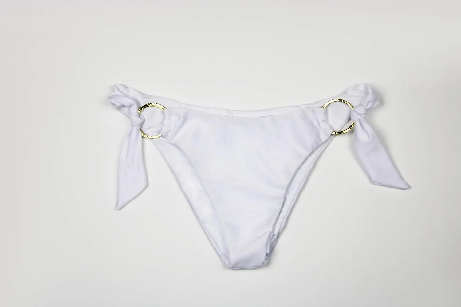 Teti Barbados slip bikini fiocchi anelli oro